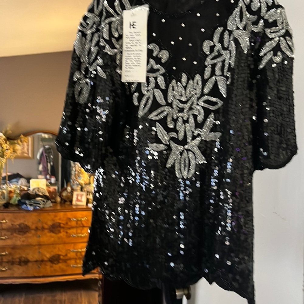 Beaded shirt has sequins, beating, sheer rhinestones just absolutely gorgeous